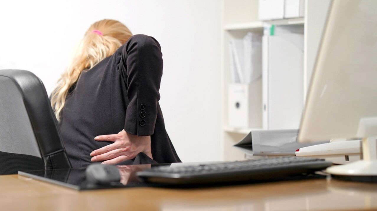 A woman is concerned about pain in the lumbar region